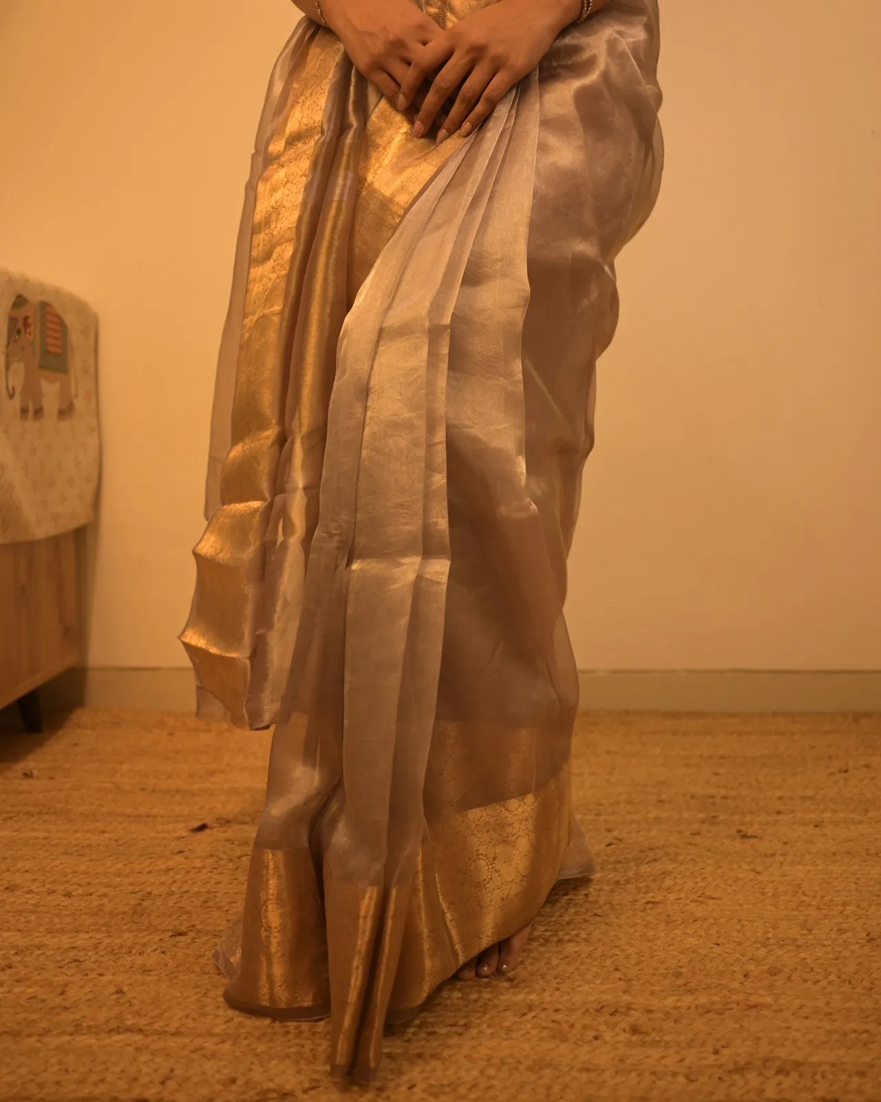 Grey gold tissue silk saree with a wide gold border